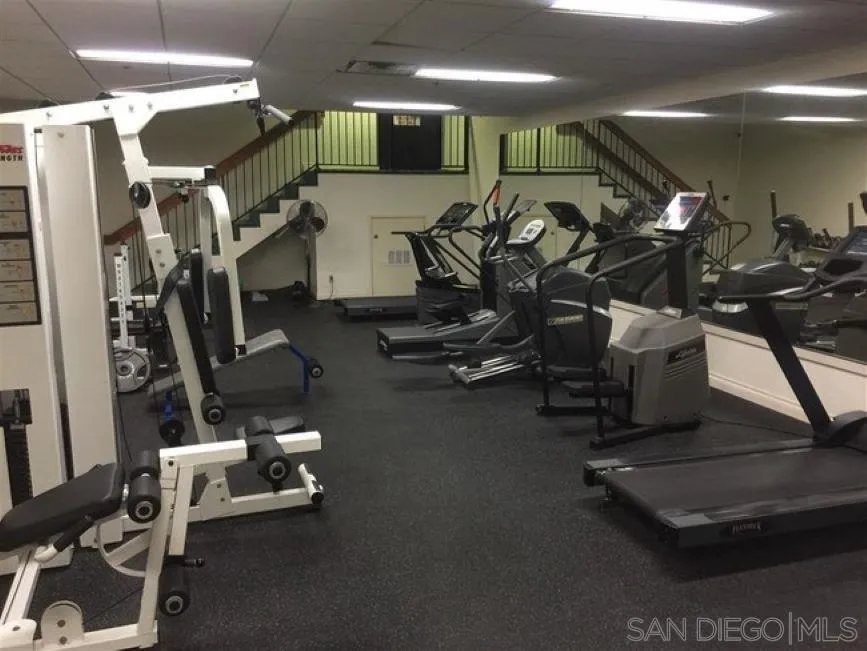 5845 Friars Road, Unit 1206 San Diego, CA 92110 - Photo 7 of 9 a view of a room with gym equipment