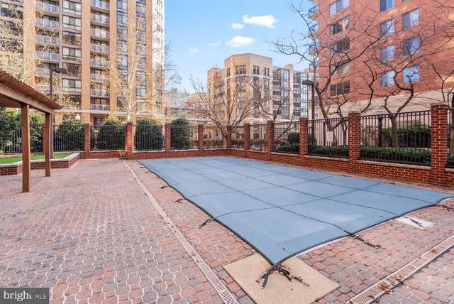 a view of a building with a yard