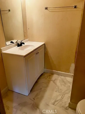 a bathroom with a toilet and a sink