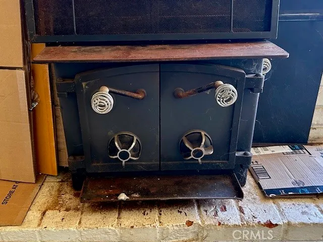 a view of a room that has a large window