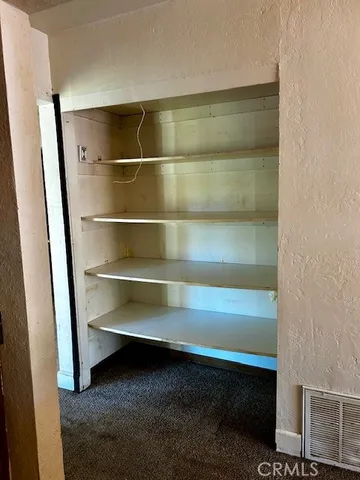 a bathroom with a sink a mirror and a window