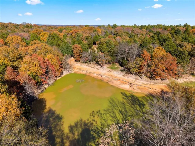 a view of a yard with a patio