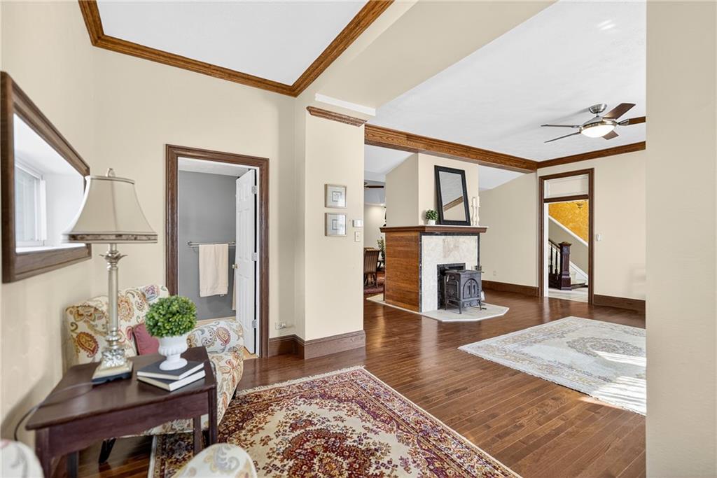 28 Whitaker Street Burgettstown, PA 15021 - Photo 12 of 50 a living room with fireplace furniture and a flat screen tv