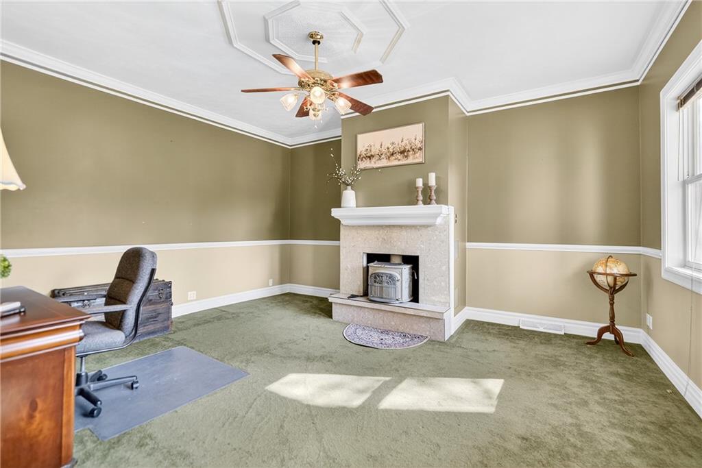 28 Whitaker Street Burgettstown, PA 15021 - Photo 19 of 50 a living room with furniture and a fireplace