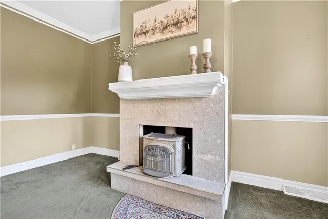 a living room with a fireplace