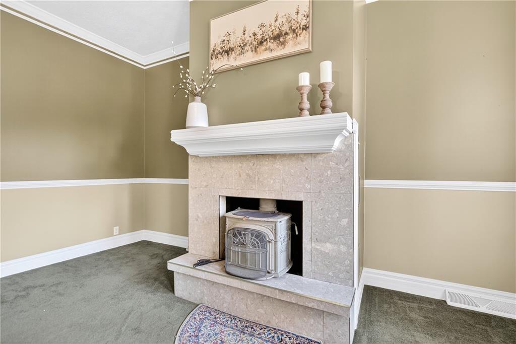 28 Whitaker Street Burgettstown, PA 15021 - Photo 20 of 50 a living room with a fireplace