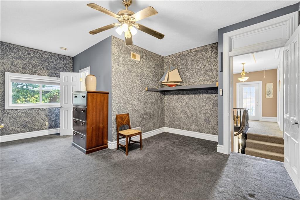 28 Whitaker Street Burgettstown, PA 15021 - Photo 29 of 50 a view of workspace with a window and a chandelier fan