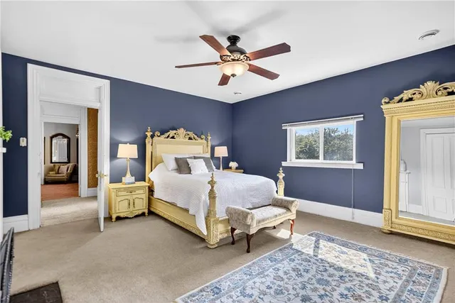 a bed room with a bed and a window