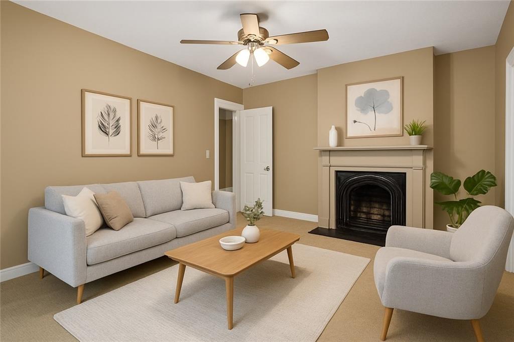 28 Whitaker Street Burgettstown, PA 15021 - Photo 42 of 50 a living room with furniture and a fireplace