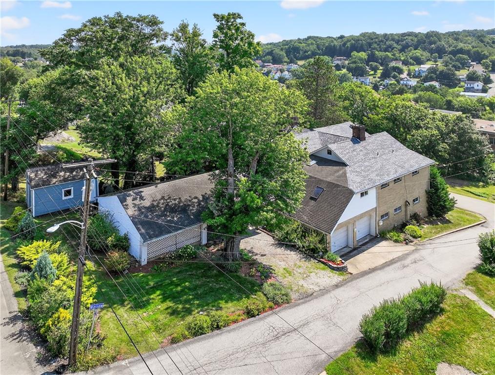 28 Whitaker Street Burgettstown, PA 15021 - Photo 48 of 50 an aerial view of a house with a garden