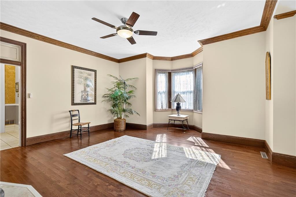 28 Whitaker Street Burgettstown, PA 15021 - Photo 9 of 50 a living room with furniture and a wooden floor