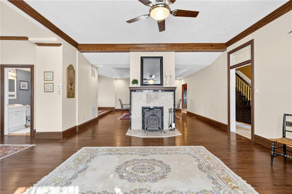 28 Whitaker Street Burgettstown, PA 15021 - Photo 10 of 50 a living room with fireplace furniture and a wooden floor