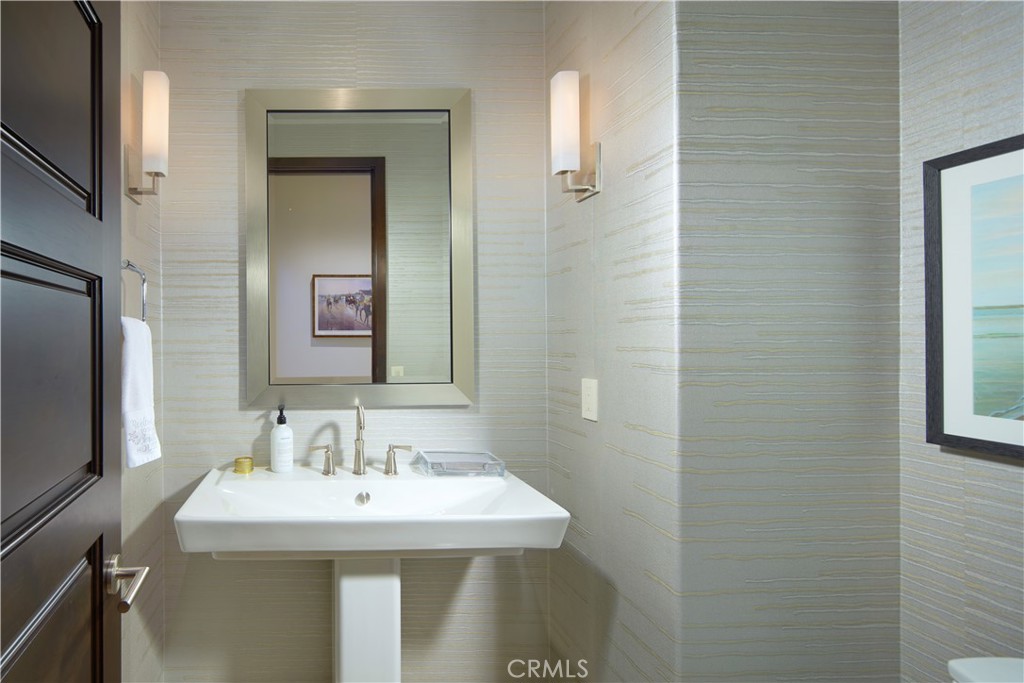 72 Monarch Beach Resort South Dana Point, CA 92629 - Photo 13 of 26 a bathroom with a sink and a mirror