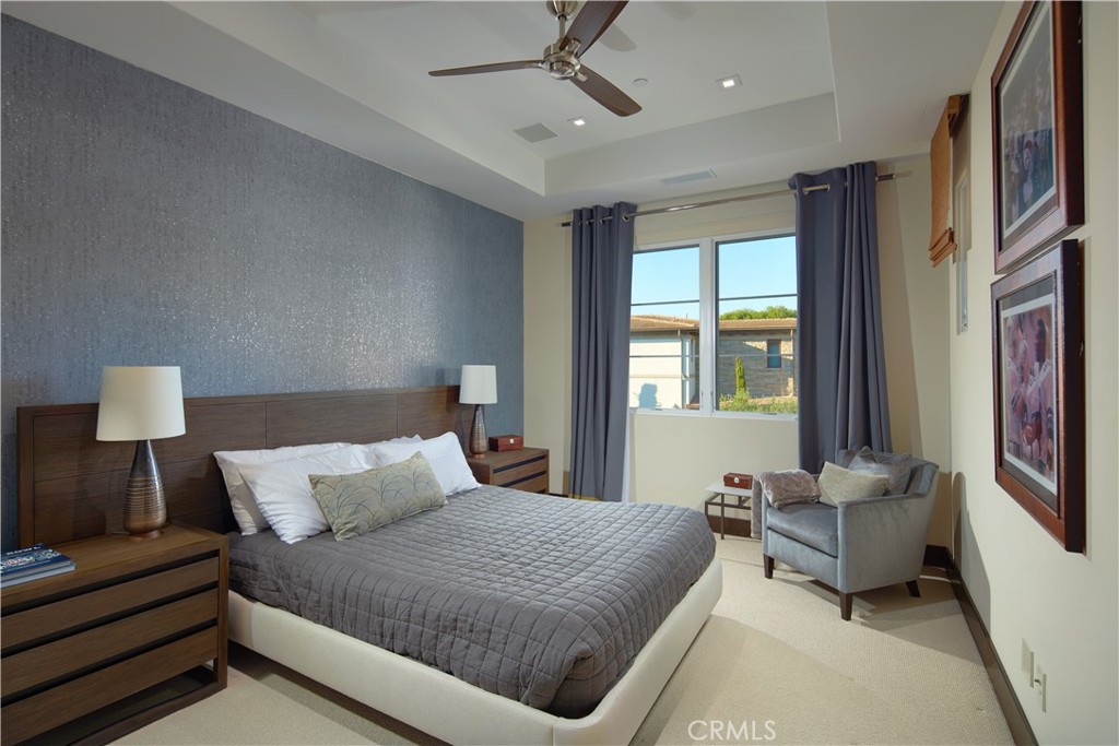 72 Monarch Beach Resort South Dana Point, CA 92629 - Photo 20 of 26 a bedroom with a bed and a large window