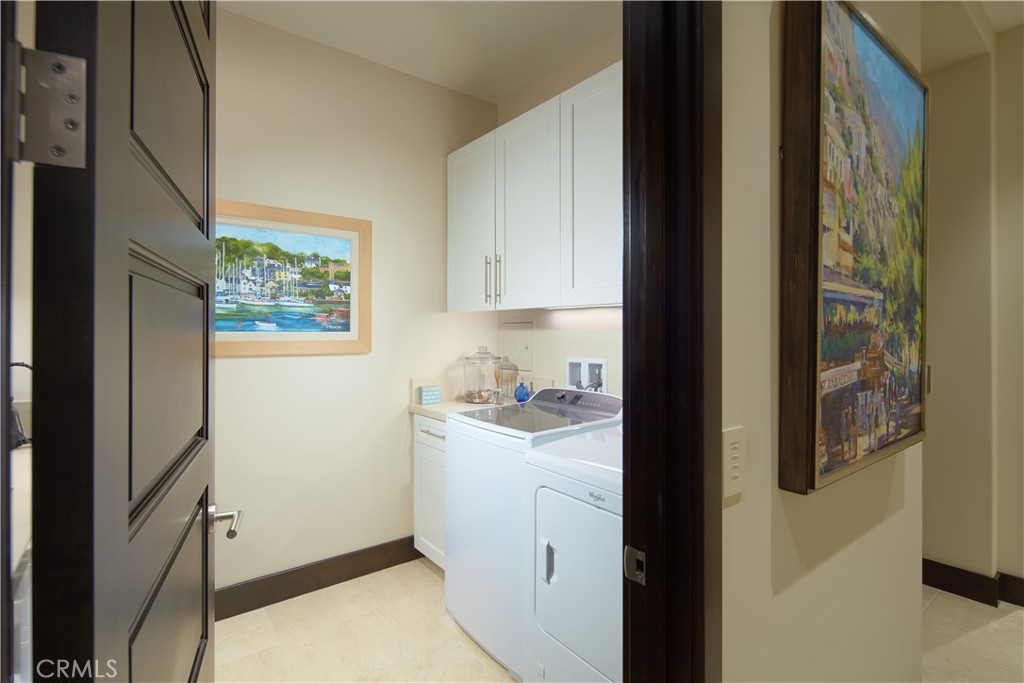 72 Monarch Beach Resort South Dana Point, CA 92629 - Photo 25 of 26 a view of a kitchen with storage and utility