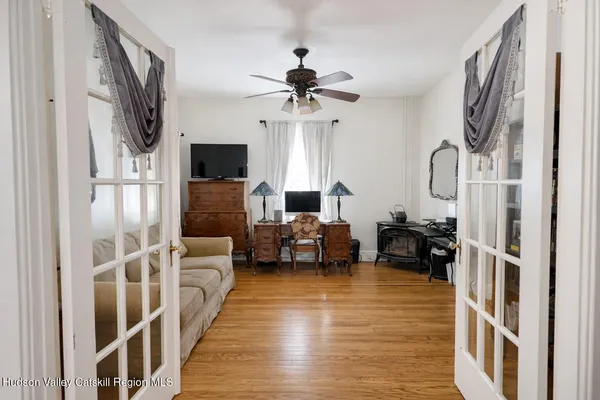 a view of a entryway with wooden floor