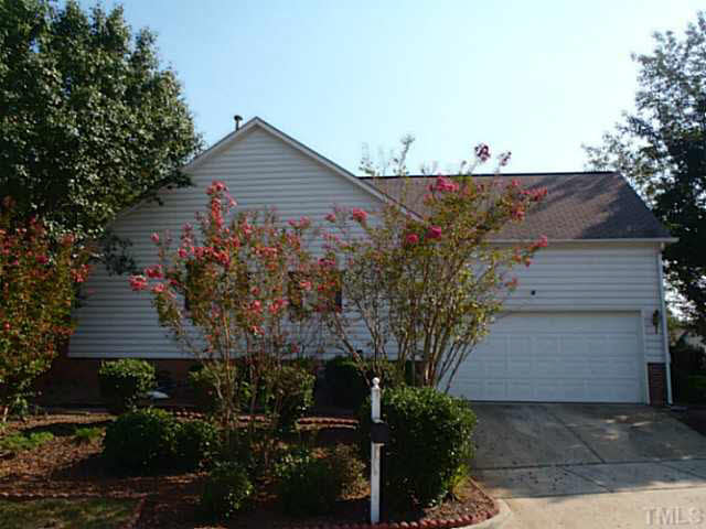 5832 Solitude Way Durham, NC 27713 - Photo 2 of 20 a view of a house with a yard and plants