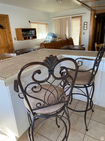 913 East 5300 North Helper, UT 84526 - Photo 10 of 29 Dining space with light tile patterned floors