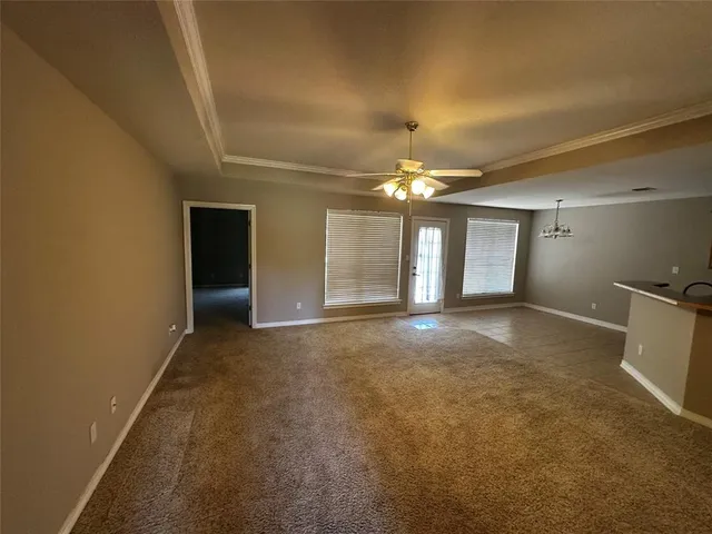 a view of a room with a chandelier