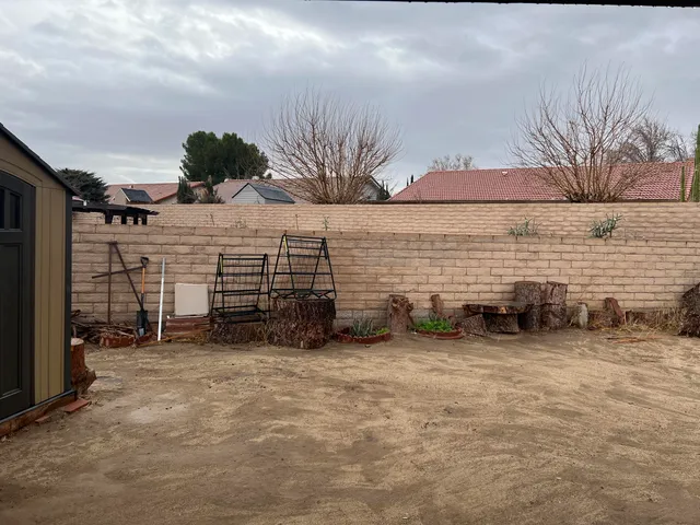a view of outdoor space and parking area