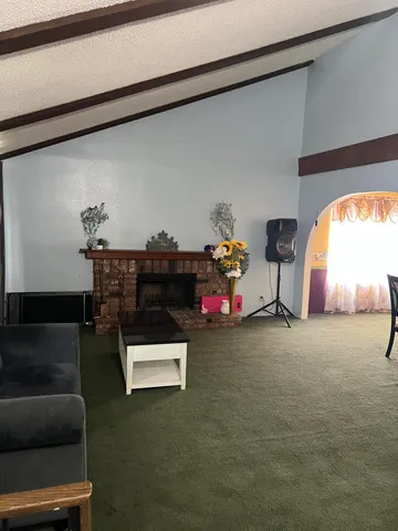 a hallway view with sitting space