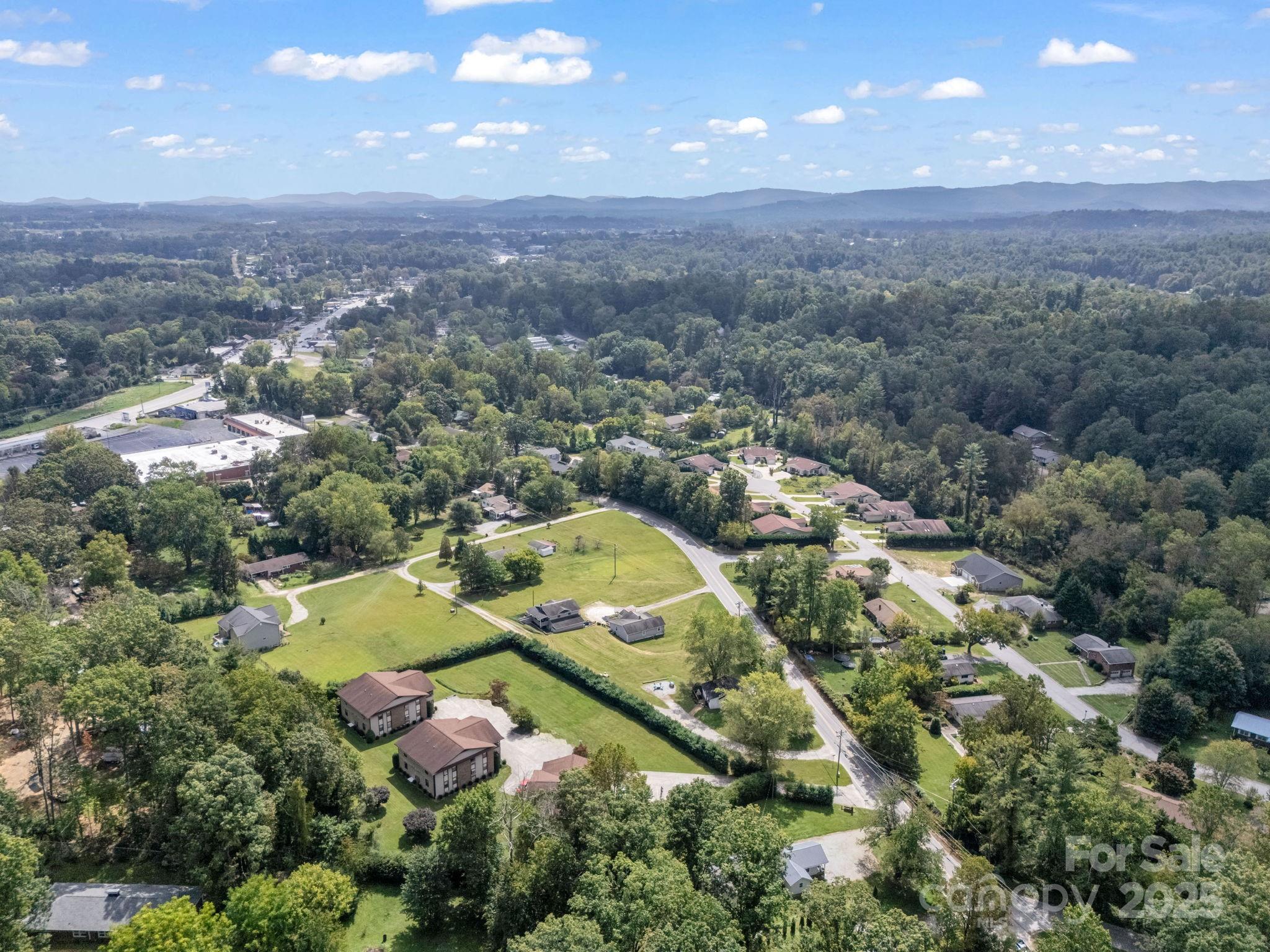 45 Indian River Road Hendersonville, NC 28791 - Photo 17 of 19 an aerial view of residential house with swimming pool and outdoor space