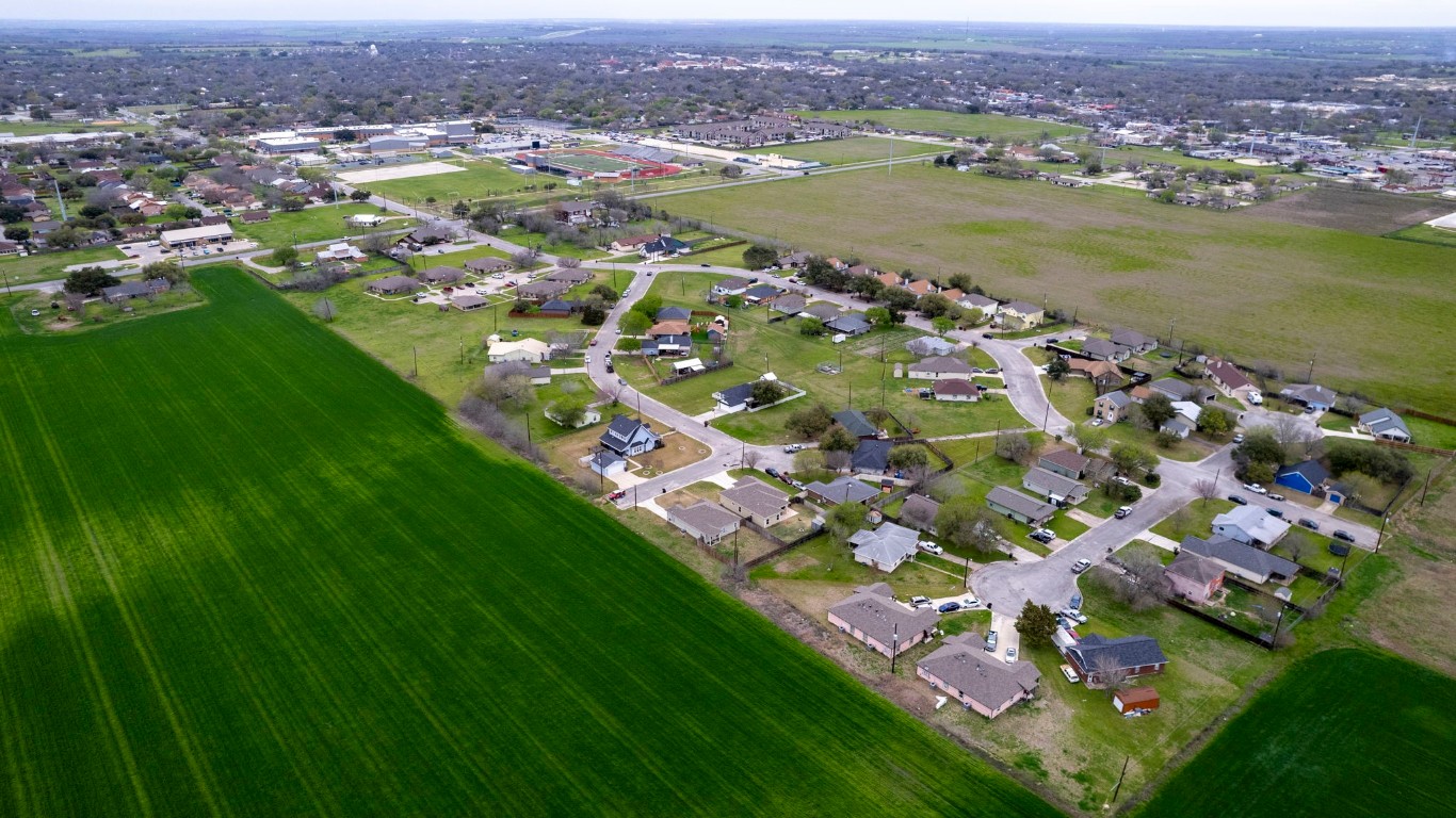 Aerial view looking towards High school with a view of the football field.