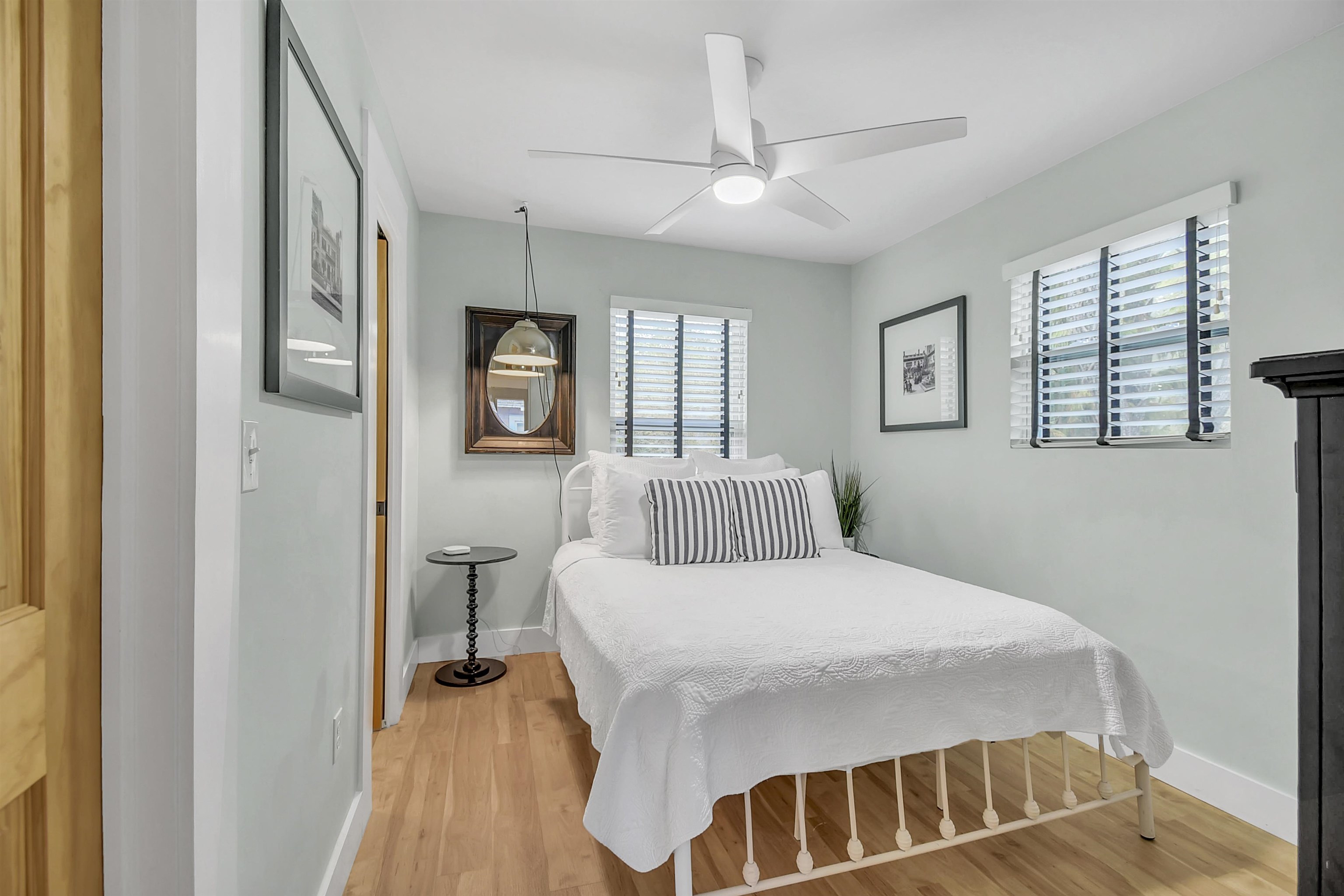 9 Sevilla Street St. Augustine, FL 32084 - Photo 52 of 75 a bedroom with a bed and wooden floor