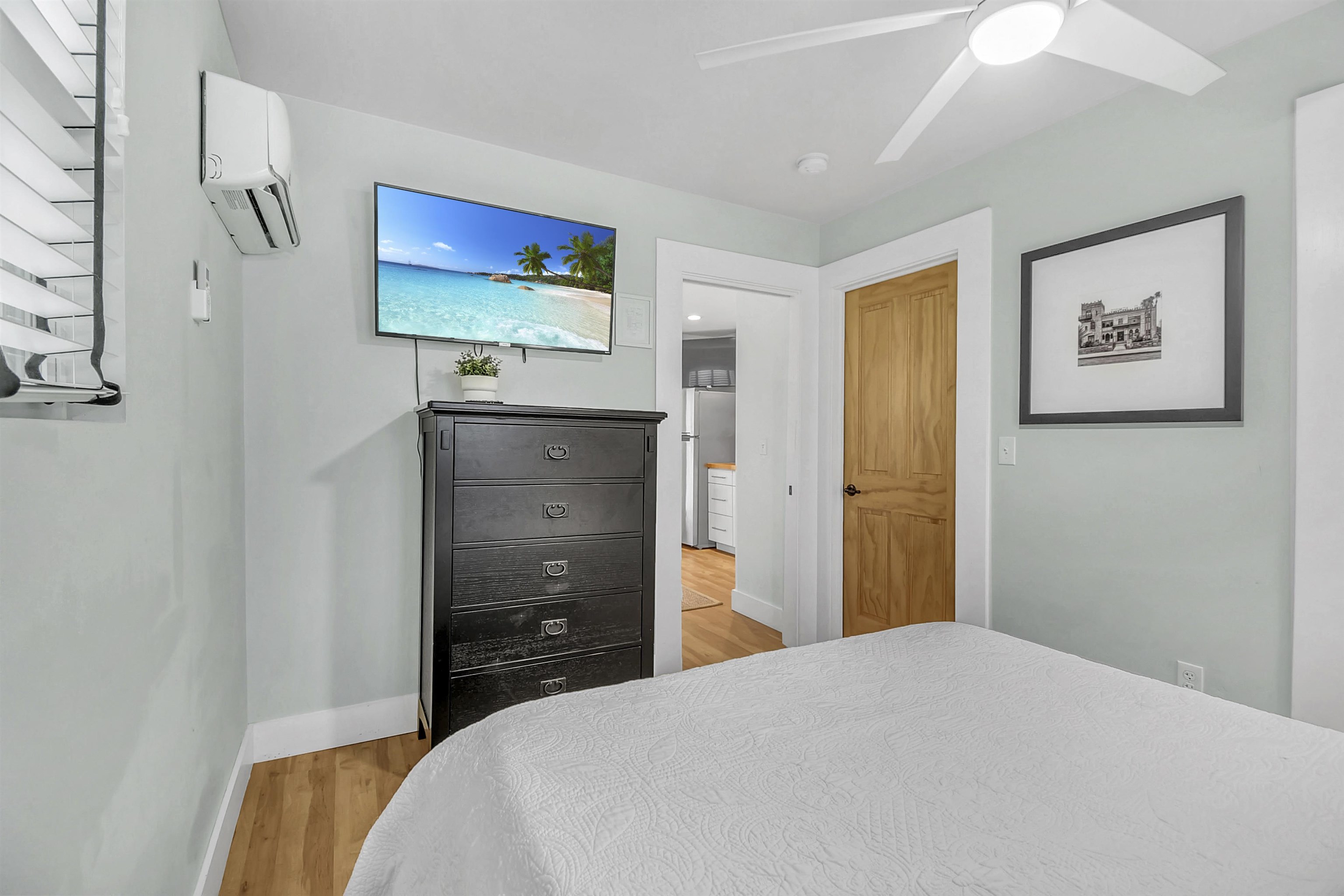 9 Sevilla Street St. Augustine, FL 32084 - Photo 53 of 75 a bedroom with a bed and a dresser
