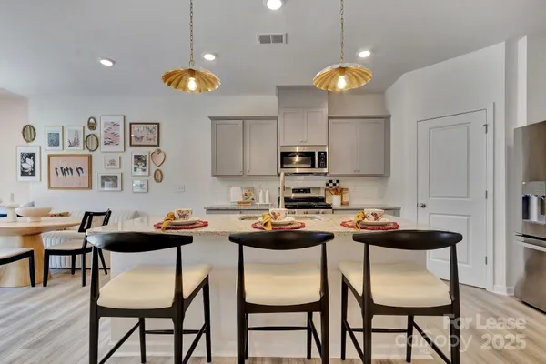 a table and chairs in a kitchen