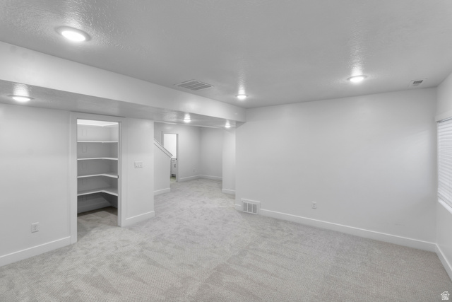 2840 West Aurora Avenue Mapleton, UT 84664 - Photo 13 of 14 Recessed lighting, light-toned carpet, built-in shelving, white walls, and a window with blinds