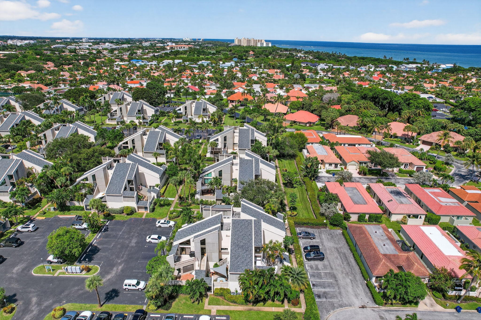 1605 Highway 1, Unit 8E Jupiter, FL 33477 - Photo 35 of 47 an aerial view of residential houses with outdoor space