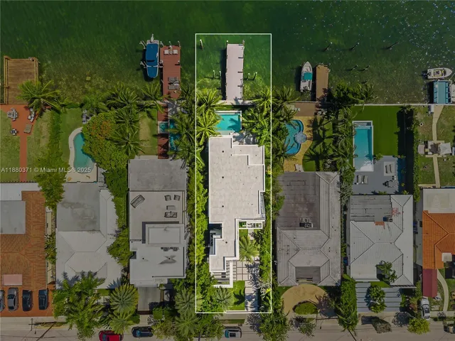 an aerial view of a house with outdoor space