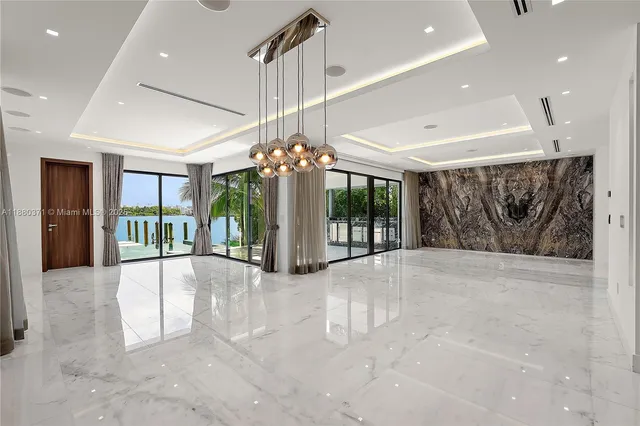 a view of an entryway with a chandelier