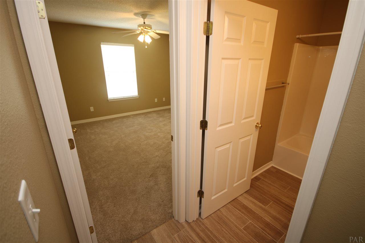 3750 Berrypatch Lane Pace, FL 32571 - Photo 40 of 45 to hall bath & bedroom #2.