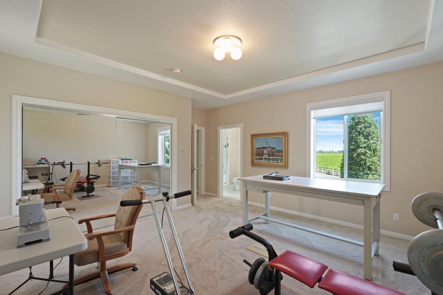 21649 Des Moines Road Acampo, CA 95220 - Photo 26 of 34 a room with gym equipment