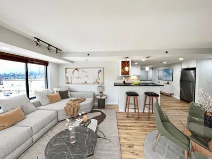 a living room with furniture and a table