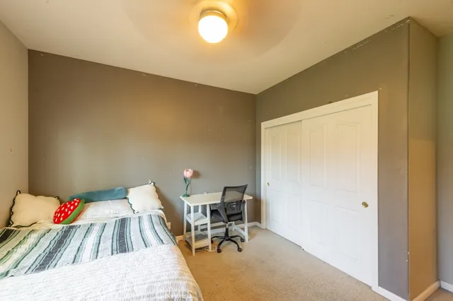 a living room with a couch and a table