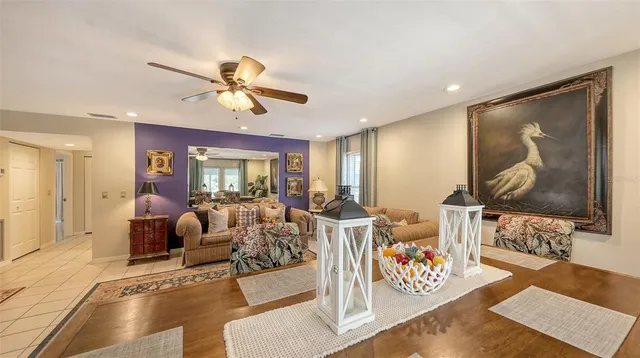 a kitchen with white cabinets and appliances