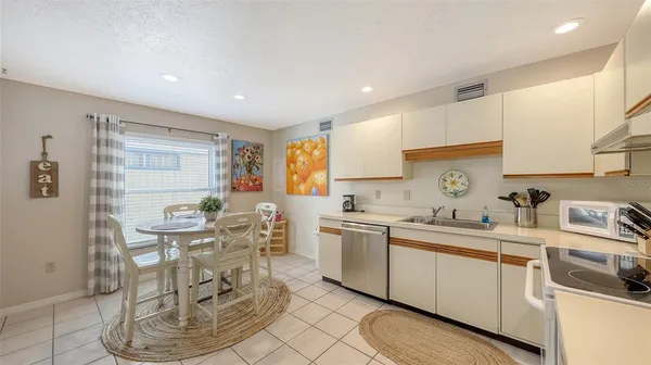 a bathroom with a shower and a sink