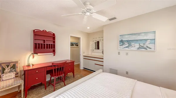 an aerial view of a house with garden space and street view