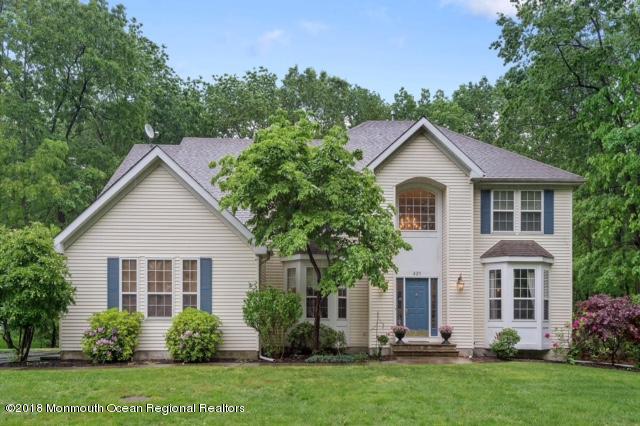 421 Diamond Road Jackson, NJ 08527 - Photo 1 of 24 a front view of a house with a yard and trees