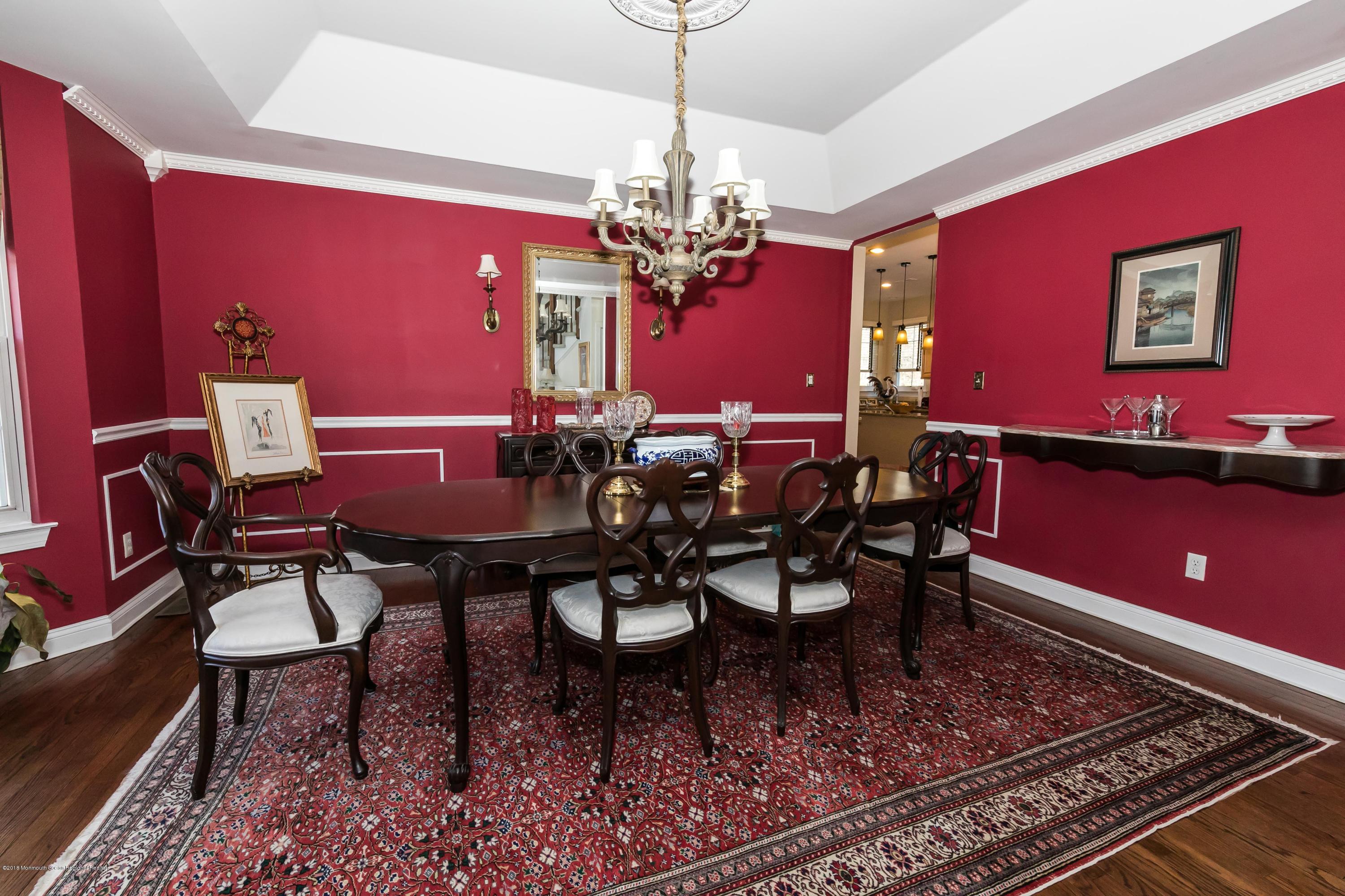 421 Diamond Road Jackson, NJ 08527 - Photo 4 of 24 a view of a dining room with furniture and chandelier