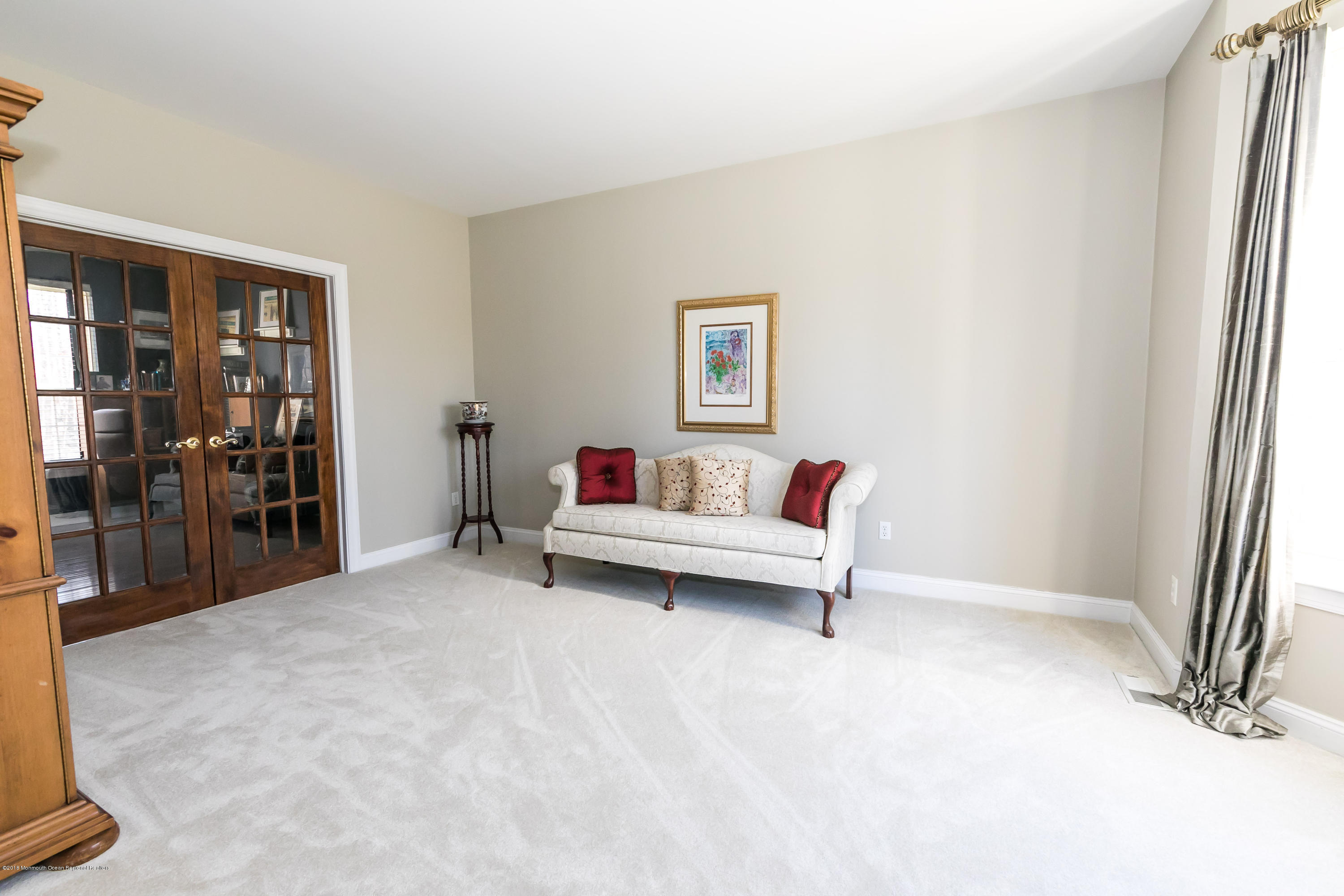 421 Diamond Road Jackson, NJ 08527 - Photo 8 of 24 a living room with furniture and a window