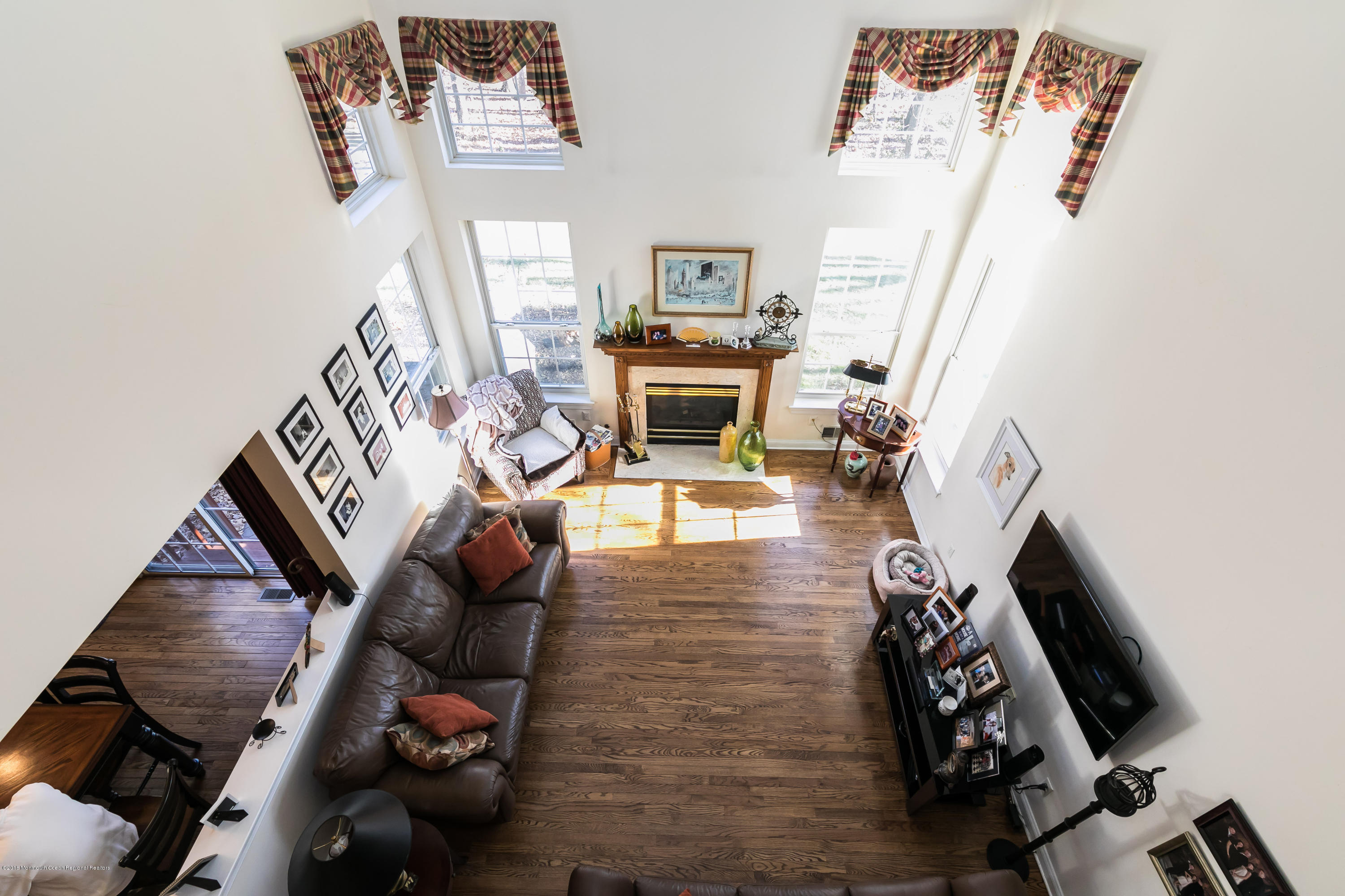 421 Diamond Road Jackson, NJ 08527 - Photo 10 of 24 a view of a livingroom with furniture and a fireplace