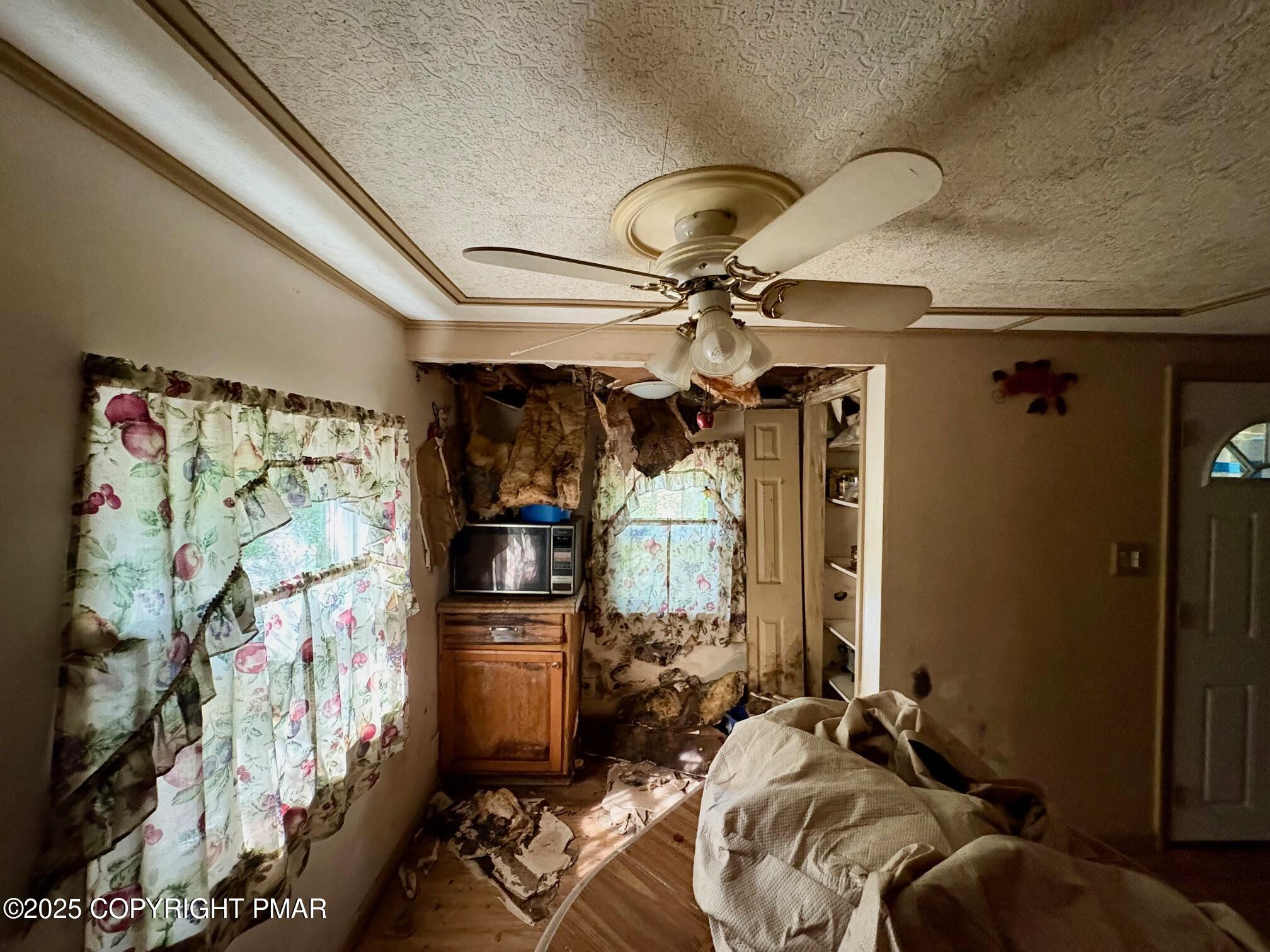 197 Koehler Road Saylorsburg, PA 18353 - Photo 3 of 9 a bedroom with furniture and a window