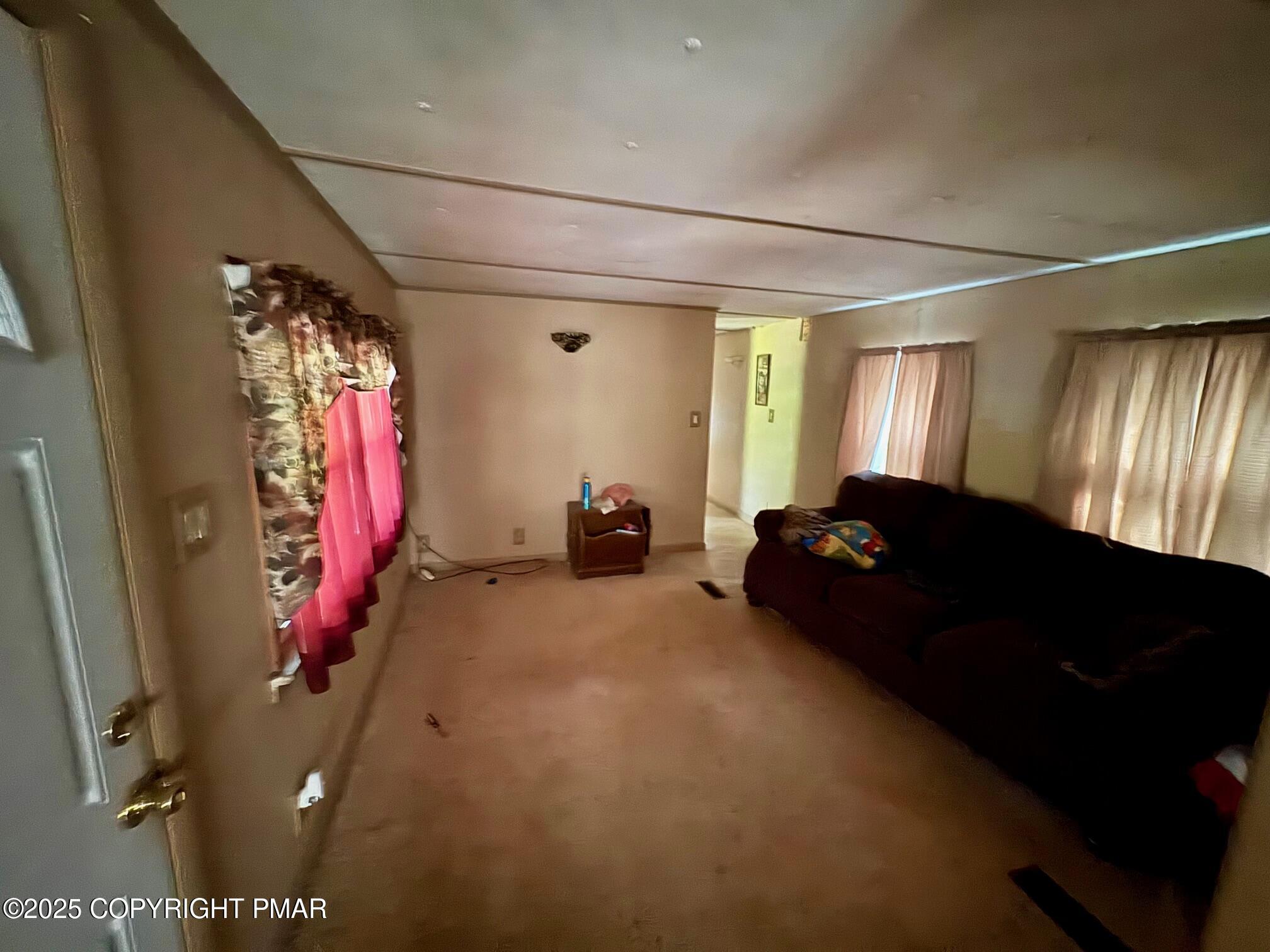 197 Koehler Road Saylorsburg, PA 18353 - Photo 5 of 9 a bed room with a bed and a window