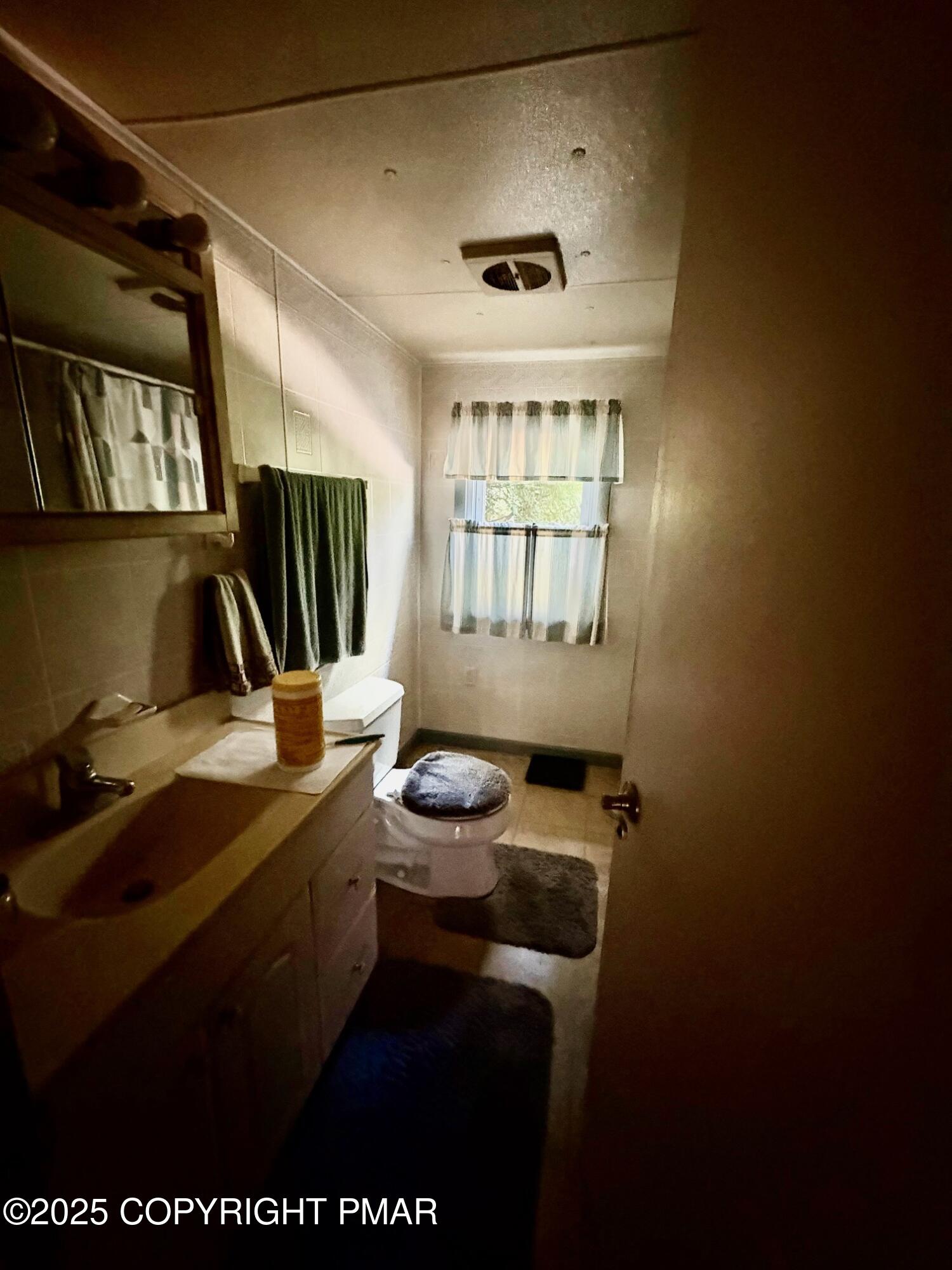 197 Koehler Road Saylorsburg, PA 18353 - Photo 7 of 9 a kitchen with a sink and a stove top oven