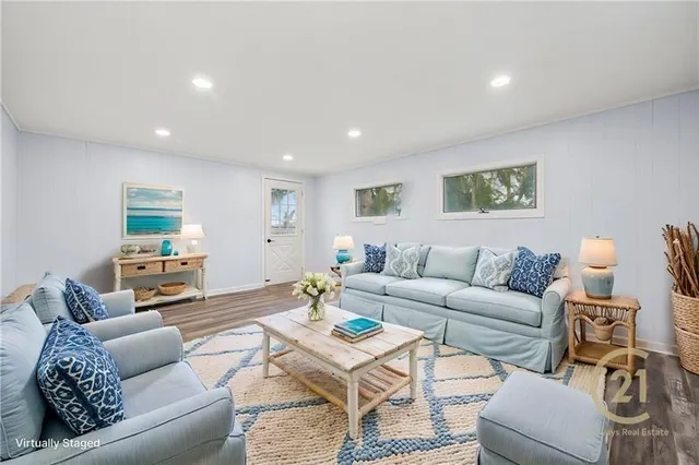 a living room with furniture and a couch