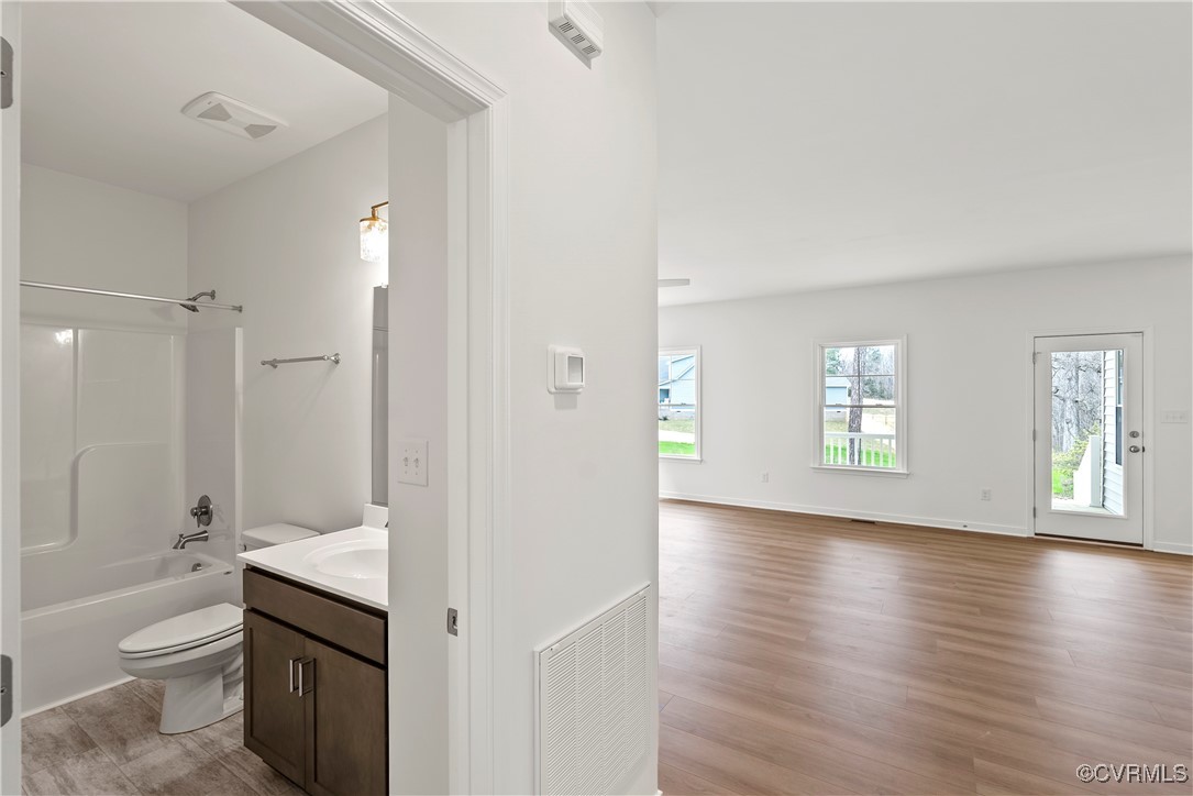 2-2 Old Telegraph Road Providence Forge, VA 23140 - Photo 12 of 19 a bathroom with a granite countertop sink toilet and shower